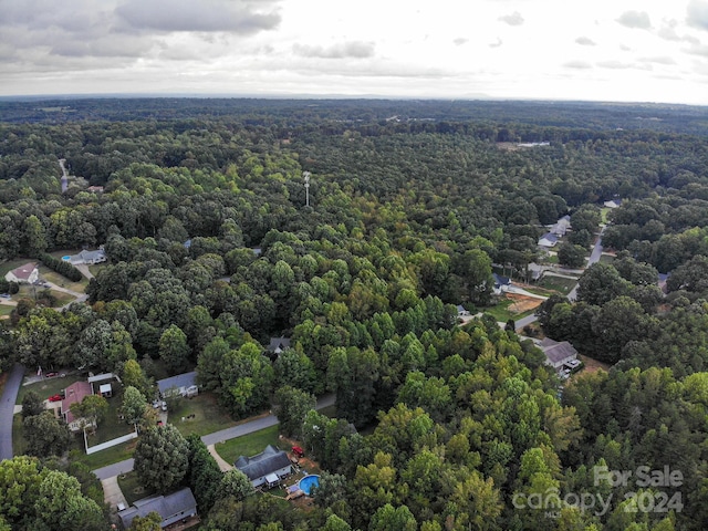 bird's eye view with a forest view