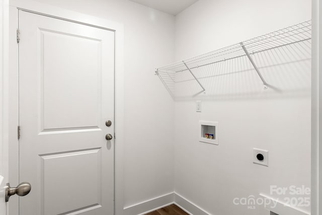 laundry room featuring washer hookup, electric dryer hookup, and hardwood / wood-style flooring