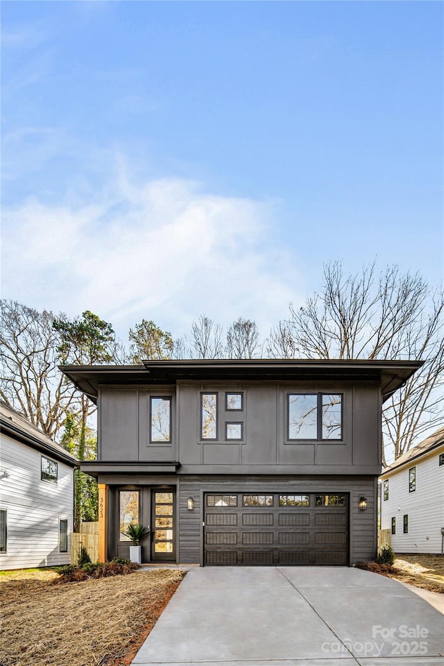 view of front of property featuring a garage