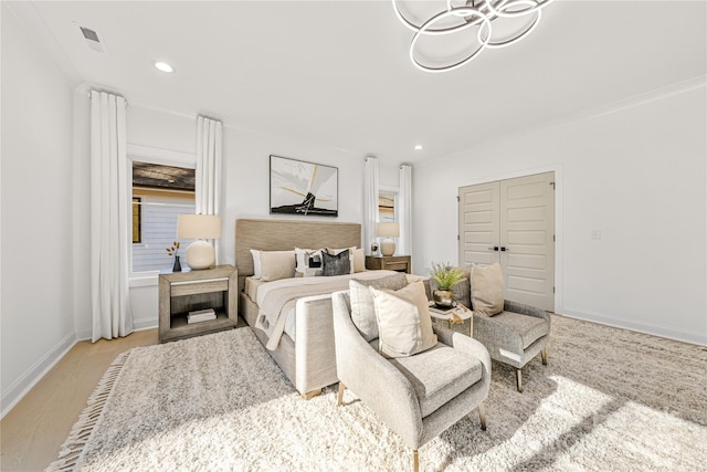 bedroom with light hardwood / wood-style flooring