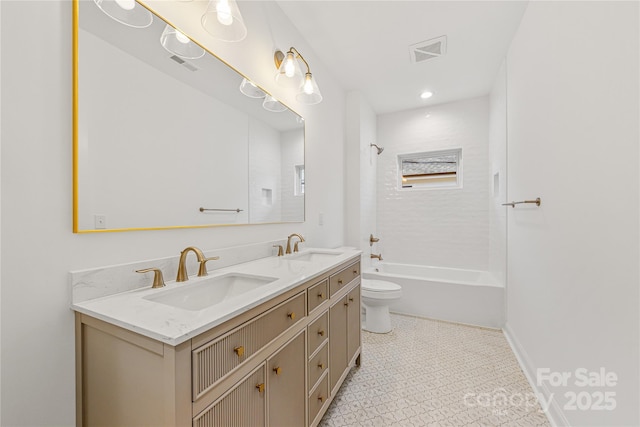 full bathroom featuring bathtub / shower combination, tile patterned floors, vanity, and toilet