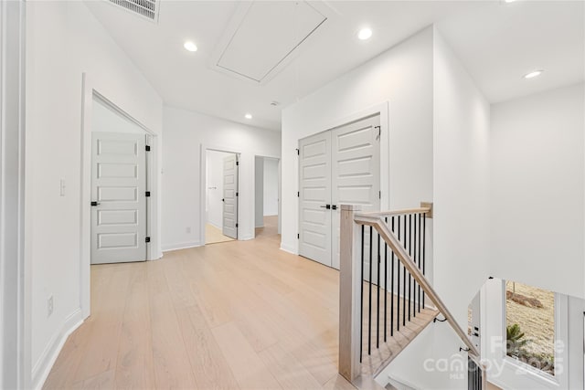 hallway with light wood-type flooring