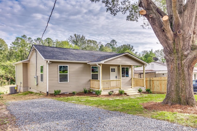 view of front of property with central AC unit and covered porch