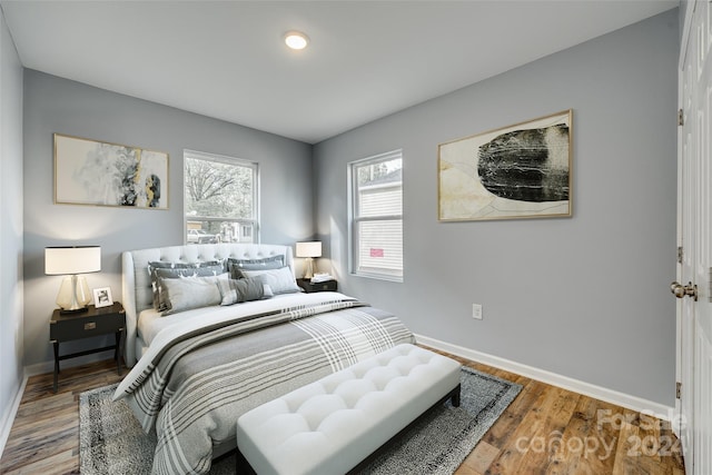 bedroom featuring wood-type flooring