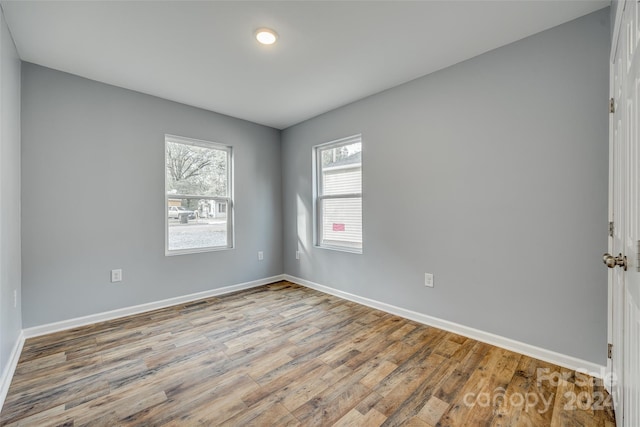 empty room featuring light hardwood / wood-style floors