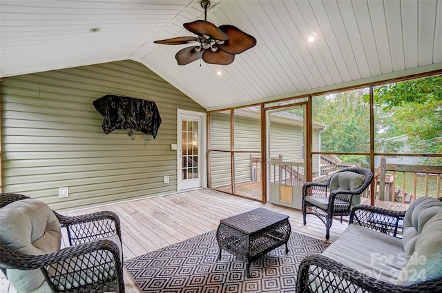 sunroom featuring ceiling fan, wood ceiling, and vaulted ceiling