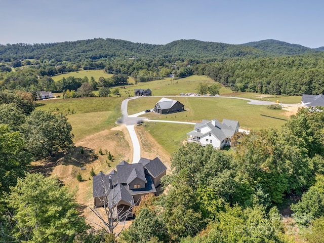 bird's eye view featuring a rural view and a mountain view