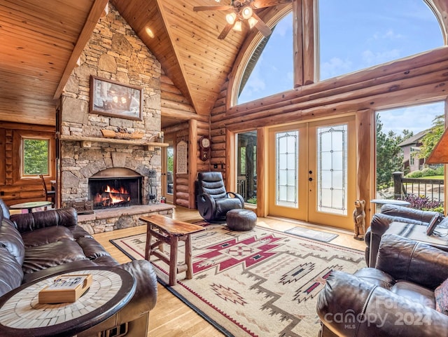 181 Highland Hts, Lake Lure, NC 28746 - living area featuring high vaulted ceiling, wood ceiling, rustic walls, wood finished floors, and ceiling fan