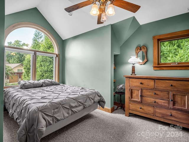181 Highland Hts, Lake Lure, NC 28746 - bedroom with multiple windows, vaulted ceiling, carpet flooring, ceiling fan, and baseboards