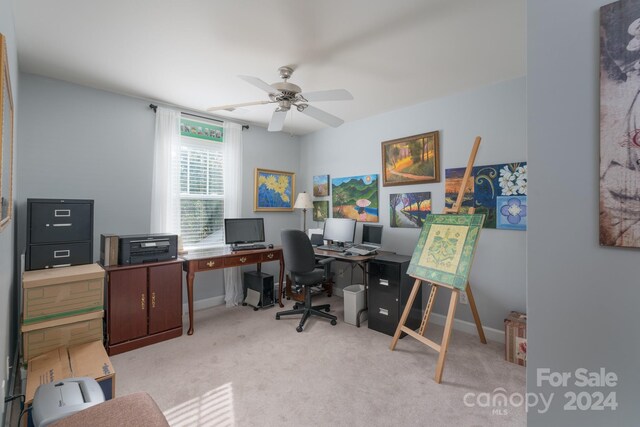 office area with ceiling fan and light colored carpet