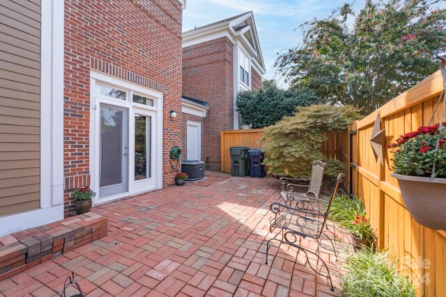 view of patio with central AC unit