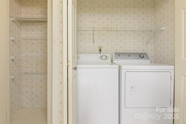 washroom with washer and clothes dryer