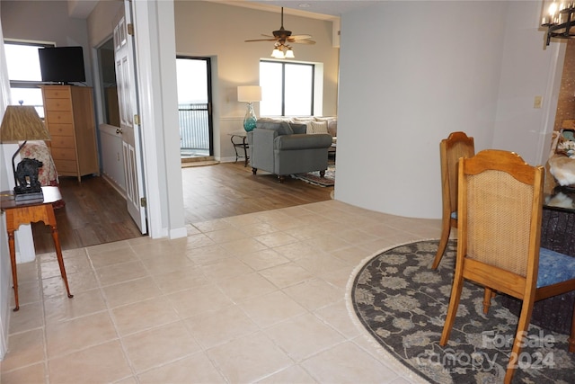 dining room featuring ceiling fan and light hardwood / wood-style flooring