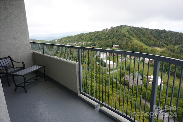 balcony featuring a mountain view