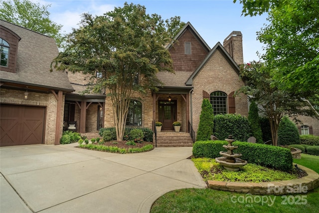 view of front of property with a garage