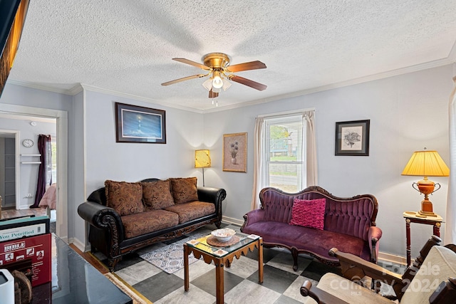 900 Alma Ave, Kannapolis, NC 28081 - living room featuring a ceiling fan, crown molding, baseboards, and a textured ceiling