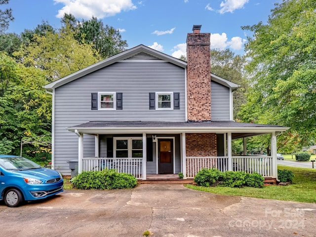 view of front of house with covered porch