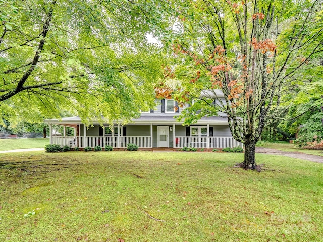 view of front of house featuring a front yard and covered porch