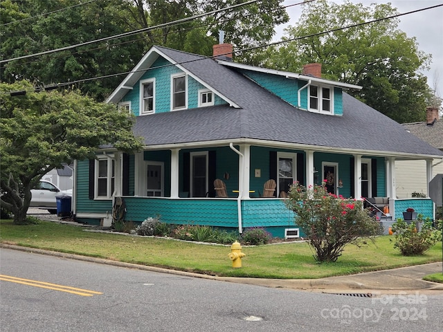 view of front of home featuring covered porch