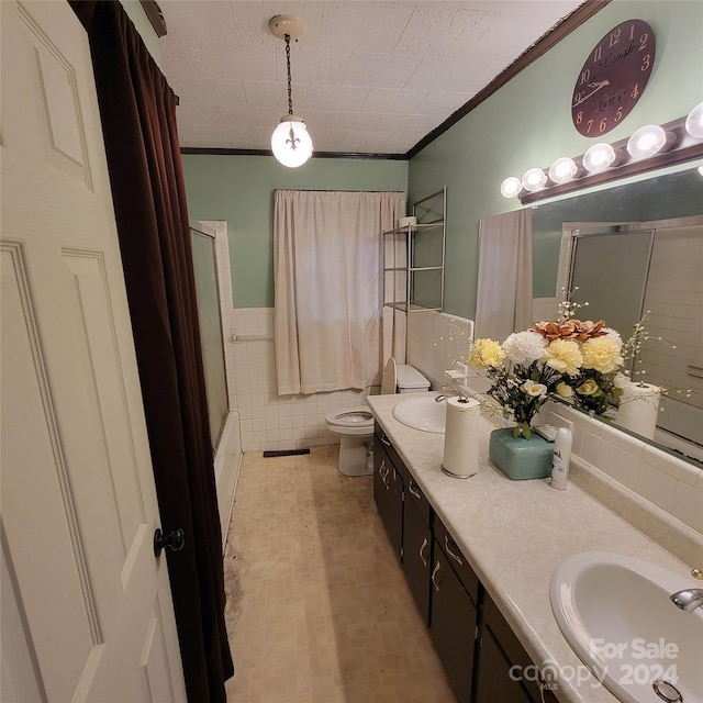 full bathroom featuring ornamental molding, toilet, tile walls, and vanity