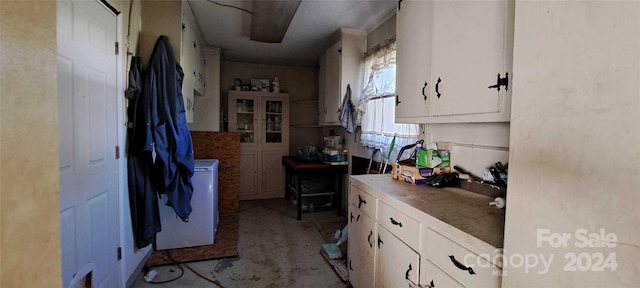 kitchen with white cabinets