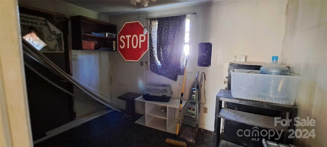 miscellaneous room with ornamental molding