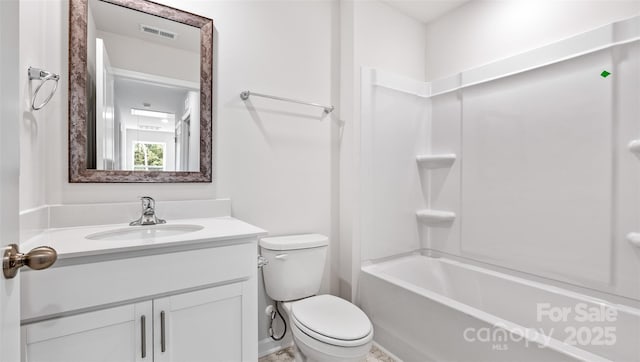 bathroom featuring toilet, shower / bathtub combination, visible vents, and vanity