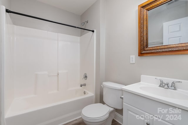 full bathroom with vanity, bathing tub / shower combination, and toilet