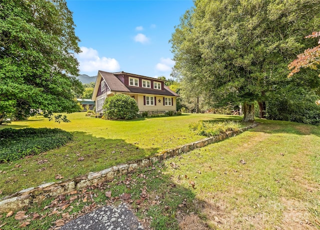 exterior space with a front yard