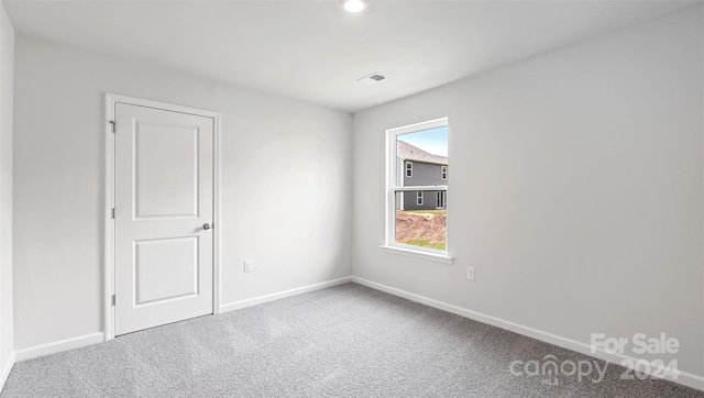 empty room featuring carpet floors