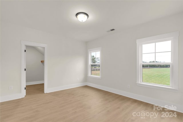 empty room featuring light hardwood / wood-style floors