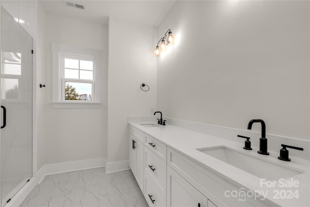 bathroom with vanity and walk in shower