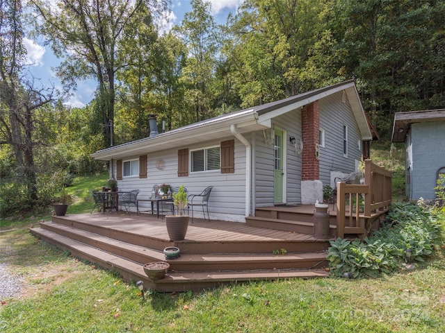 exterior space featuring a wooden deck