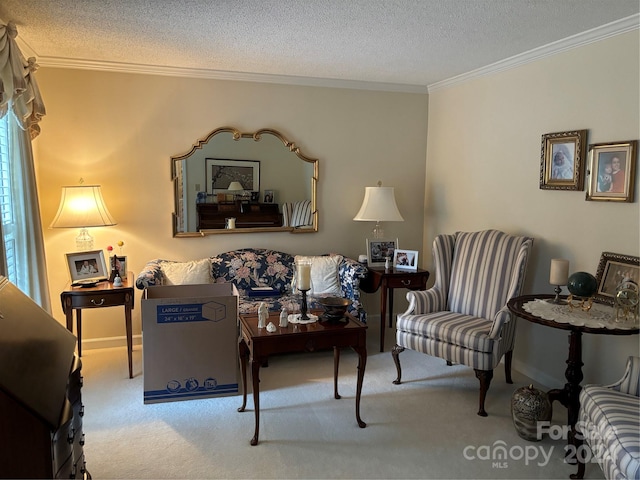 living room featuring ornamental molding, light carpet, and a textured ceiling