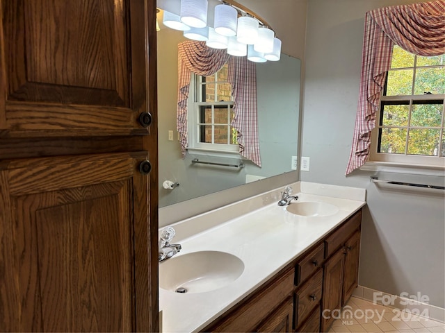 bathroom featuring vanity and tile patterned flooring