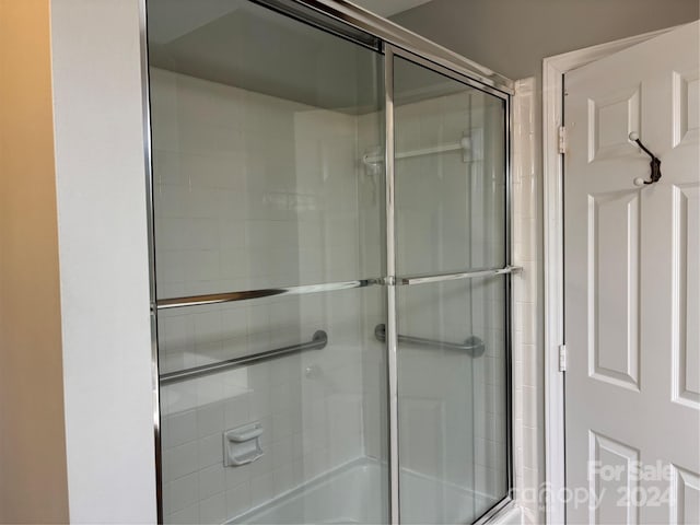 bathroom featuring an enclosed shower