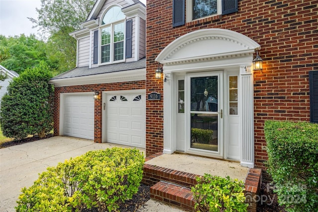 entrance to property featuring a garage