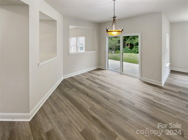 empty room featuring hardwood / wood-style floors