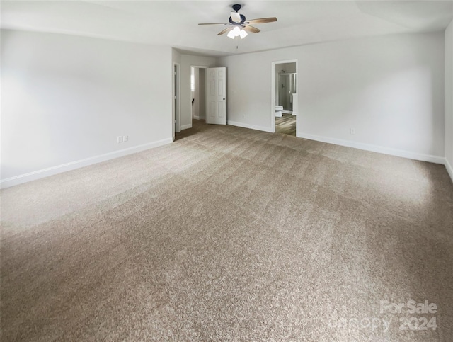 carpeted empty room with ceiling fan