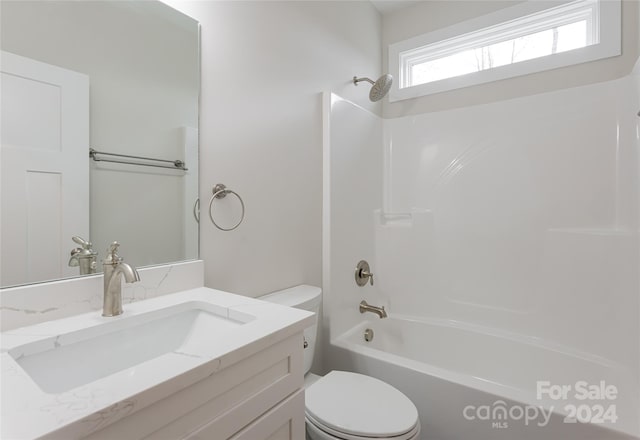 full bathroom with vanity,  shower combination, and toilet