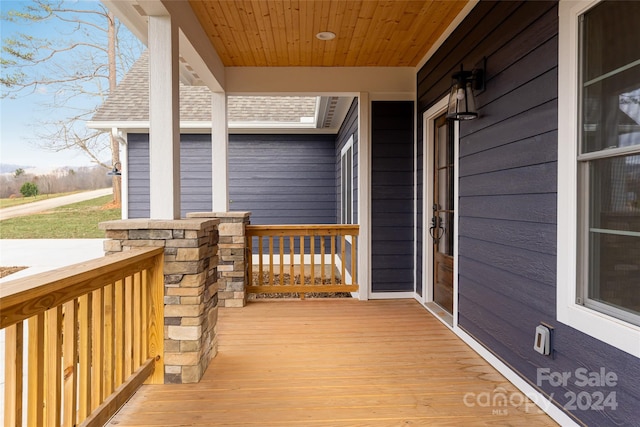 wooden deck with covered porch