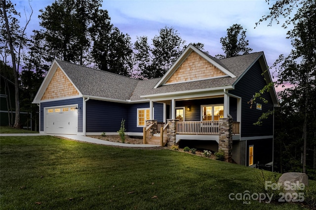 224 Country Dr, Mars Hill, NC 28754 - craftsman-style house featuring a garage, a shingled roof, a porch, and a lawn