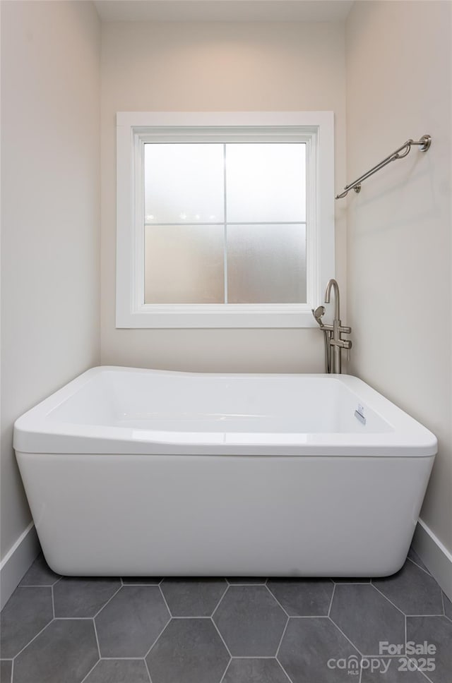 224 Country Dr, Mars Hill, NC 28754 - bathroom with a freestanding bath and tile patterned floors