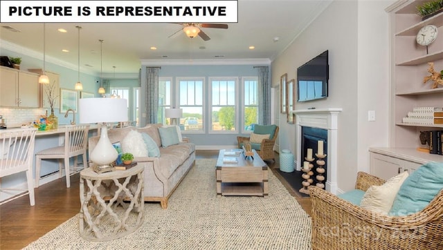 living room with crown molding, plenty of natural light, ceiling fan, and light wood-type flooring