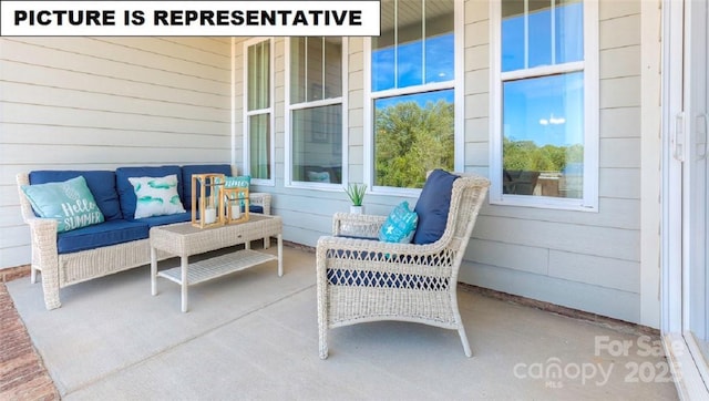 view of patio with an outdoor hangout area