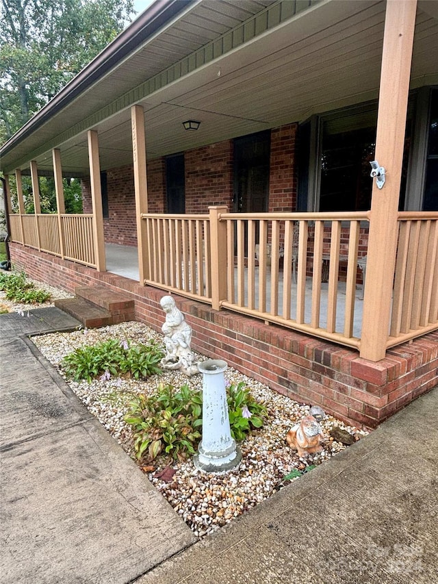 doorway to property with a porch