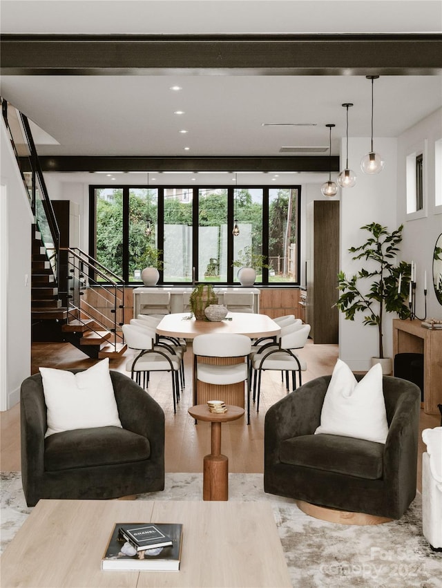 living room with hardwood / wood-style floors and a wealth of natural light