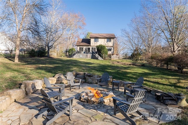 view of patio with a fire pit