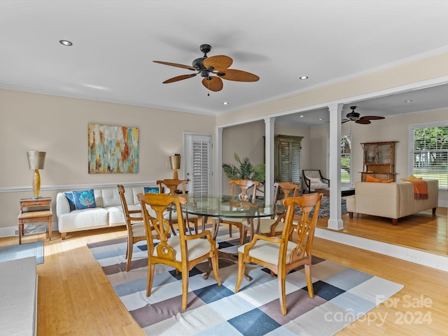 dining area with ceiling fan, hardwood / wood-style flooring, and crown molding