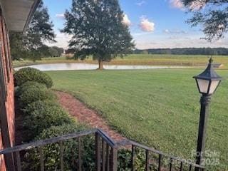 view of yard with a water view